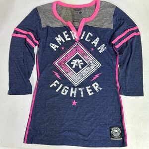 BUCKLE American Fighter Women’s Blue and Pink Henley V Neck Long Sleeve Shirt